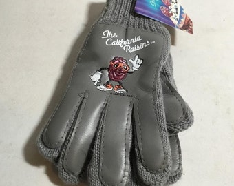 Vintage California Raisins Handschuhe, NEU mit Tags. "The California Raisins" Kommerzielles Phänomen der Tanzenden Rosine ." Graue Strickstoff & Kunstleder.