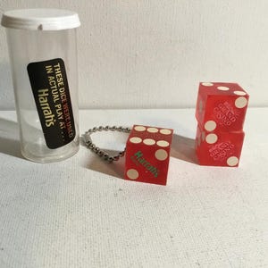 Vintage Casino Dice  Harrah's Casino Crisloid Translucent Canceled Gaming Dice.    Harrah's Reno & Grand Casino, Biloxi.