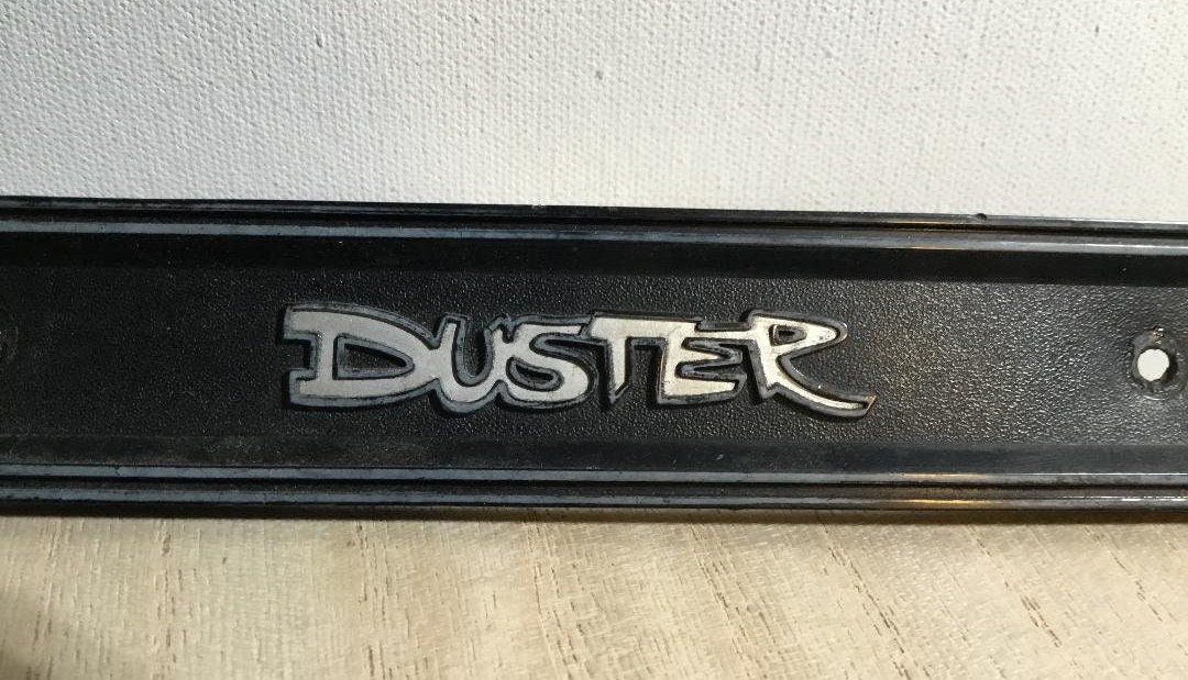 Vintage Duster Interior Door Panel Emblem. 1970-1972 Plymouth Duster MOPAR OEM #3499375 Interior Door Panel Emblem. Black Plastic Emblem