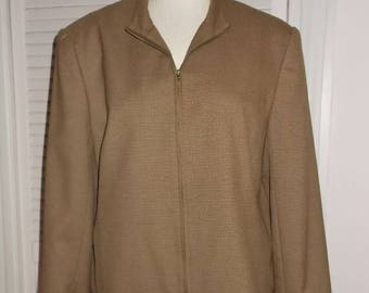 May include: A brown zip-up jacket with a stand-up collar.