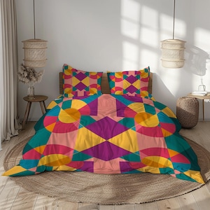 May include: A colorful geometric patterned bedding set. The set includes a duvet cover and two pillowcases. The design features a vibrant mix of shapes and colors, including yellow, pink, teal, and purple. The bedding is displayed on a wooden bed frame.