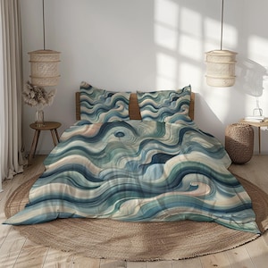 May include: A blue and white wave patterned bedding set with two pillowcases. The bedding is on a light brown woven rug.