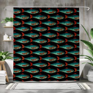 May include: A shower curtain featuring a repeating pattern of teal fish with orange fins and tails arranged in horizontal rows against a solid black background. The fish are depicted in a side profile view with consistent spacing throughout the design.