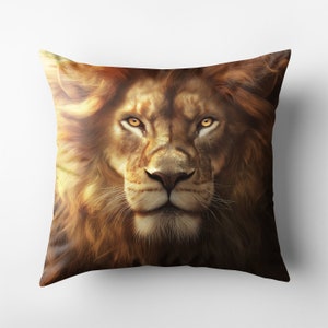 May include: Close-up of a lion's face with a golden mane. The lion has piercing yellow eyes and a serious expression.