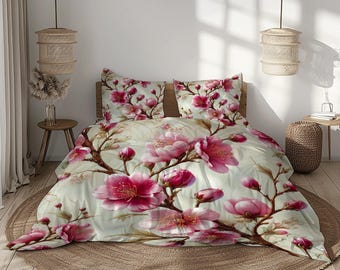 Juego de ropa de cama con estampado de flores de cerezo: funda nórdica y fundas de almohada con diseño floral.