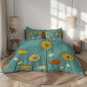May include: Teal-colored duvet cover and pillowcases featuring a retro floral design in yellow, orange, and cream. The bedding set includes a duvet cover and two pillowcases, creating a cohesive and stylish bedroom aesthetic.