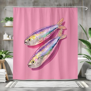 May include: Pink shower curtain featuring two stylized fish with iridescent scales. The fish have yellow eyes and peach-colored fins, set against a solid pink background. The curtain is hanging in a bathroom setting.