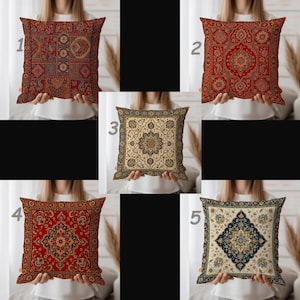 May include: Five decorative cushions with detailed, vintage patterns. The cushions display a range of colours, including red, beige, blue, and gold. Each cushion has a unique design, with floral and geometric motifs.