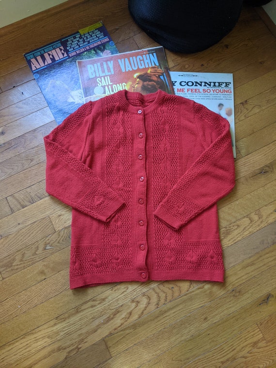 Bright red cardigan