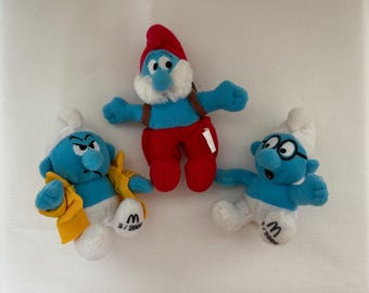 Vintage Happy Meal speelgoed smurfen set van 3 McDonald's speelgoed collectible 2000 Blue Creatures Drawfts knuffels met tas en jas