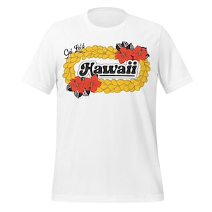 May include: White t-shirt with a graphic design. The design features the word "Hawaii" in a black, stylized font, framed by a yellow lei and red hibiscus flowers. The phrase "Get Leid" is above the word "Hawaii".