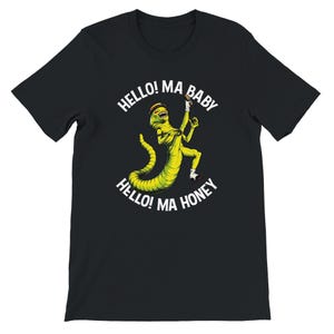 May include: Black t-shirt with a cartoon worm character in yellow and green, wearing a hat and shoes, with arms raised. The text "HELLO! MA BABY, HELLO! MA HONEY" is printed in white around the character.
