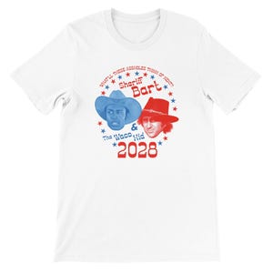 May include: White t-shirt featuring a graphic with two portraits, one in a blue cowboy hat and the other in a red hat. Text includes "Sheriff Bart & The Waco Hid 2028" and "WHATLL THESE ASSHOLES THINK OF NEXT?"