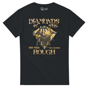 May include: Black t-shirt with a graphic of Neil Diamond and band members, and the text "Diamonds in the Rough 2001 Tour". The design features gold and diamond accents, and the Dark Star logo.