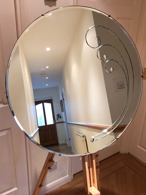 A Round Bevelled Edge Vintage Mirror A Round Bevelled Edge Vintage Mirror