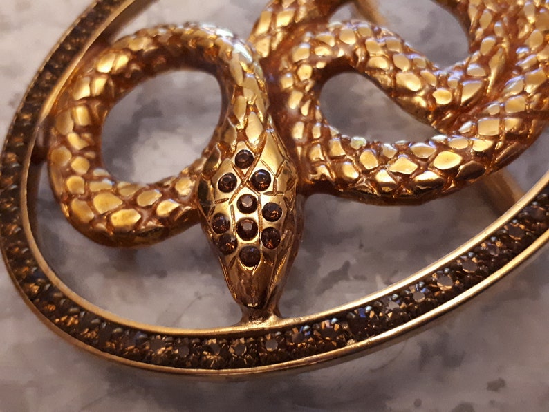 Golden snake belt buckle encrusted with rhinestones 85 x 65 mm