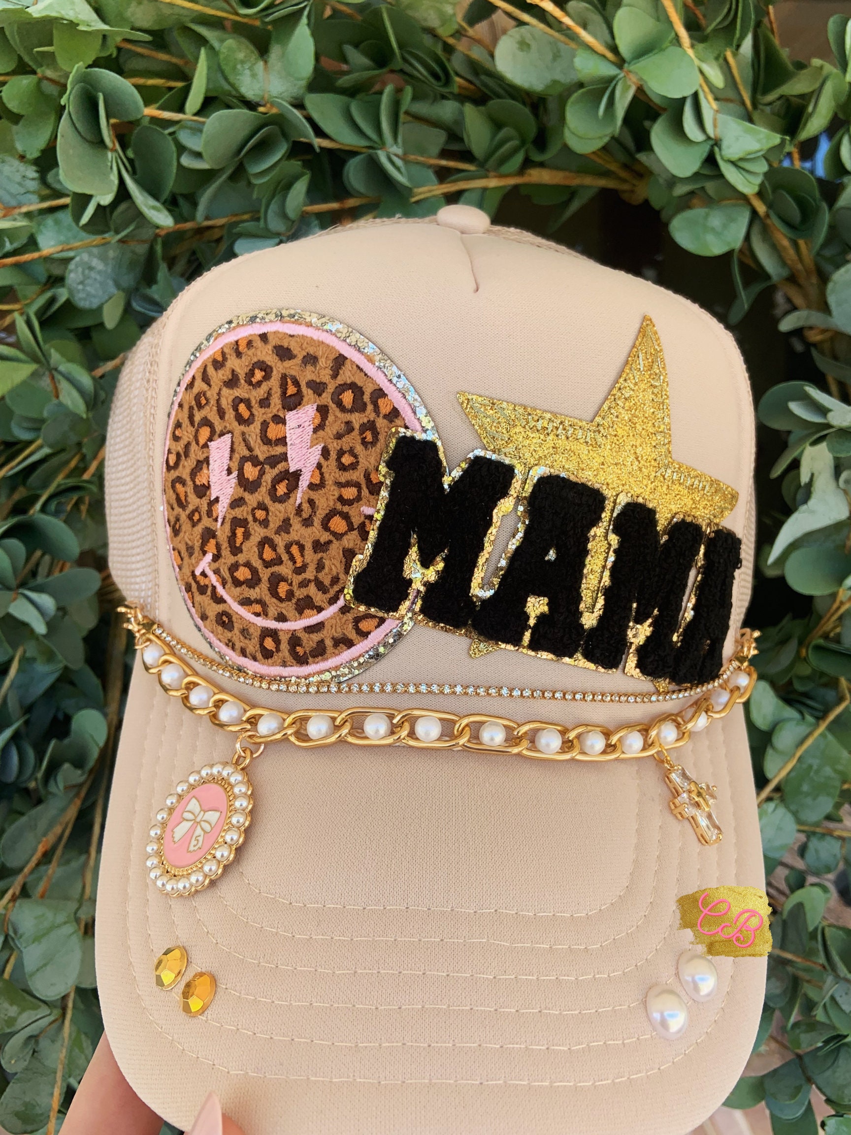 Women's tan trucker hat with hat chains, leopard smiley face, mama patch, bow, pearls, gold star, bling hat, cross charm