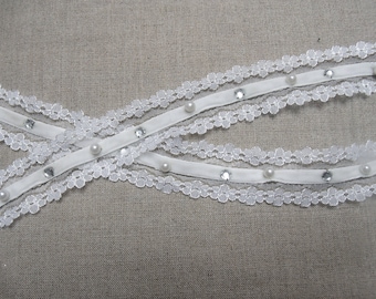 Embroidered lace beaded on velvet in the Center base