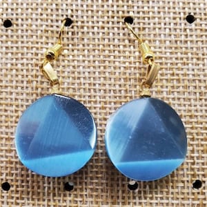 pretty pair of triangle earrings in a circle symbol of strength, please tell us the pendant when ordering
