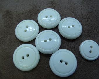 white acrylic button with 2 holes 22 mm, sold by 6 / or 0.91 euros per unit