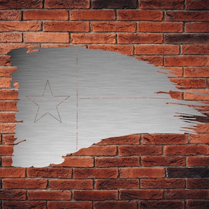 May include: A silver star on a brushed metal background, appearing as if it has been torn from a brick wall.