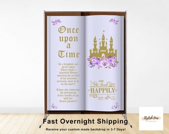 Fairytale baby shower backdrop with "Once upon a time" giant storybook and castle backdrop