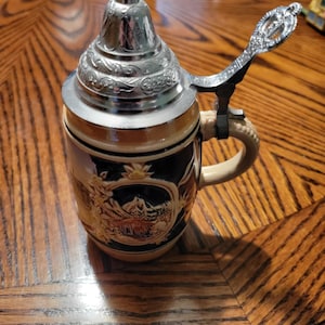 Vintage Gerz Beer Stein with Pewter Lid – Authentic "Pitcher in Triangle" Mark – Hand-Painted Relief Scene