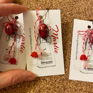 Red oval glass Martisor/ Martisoare/ Babamarta / Martenitsa ethnic symbol of spring. Handmade by gudimaO