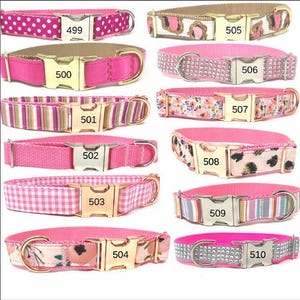 May include: Ten pink dog collars with different patterns and gold or silver buckles. The collars are numbered 499 to 510.