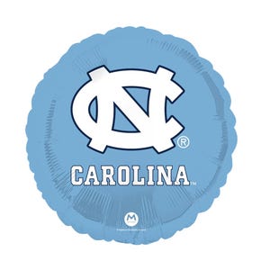 May include: A light blue round balloon featuring the University of North Carolina logo in white. The word "CAROLINA" is printed in white below the logo. The balloon has a metallic finish.