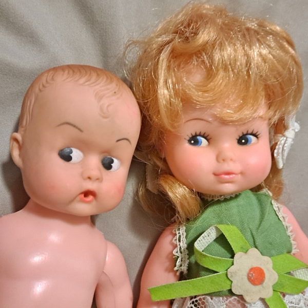 1960s 1970s vintage kawaii made in Hong Kong doll lot fair condition side-eye baby green daisy pantsuit pigtails Kewpie head