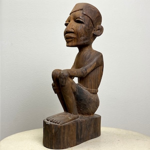 Vintage Makonde Hand Carved Rosewood Seated Young Man with “Dinembo” Face (ca. 1960, Tanganyika)