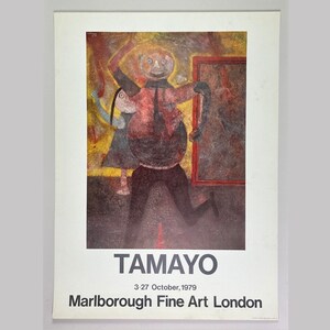 May include: A poster advertising an exhibition of artwork by Tamayo, a Mexican painter. The poster features a painting of a large, colorful figure with a smaller figure beside it. The text on the poster reads "Tamayo" and "Marlborough Fine Art London".