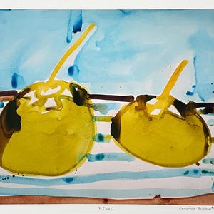 May include: Watercolor painting of two yellow fruits with long stems, possibly mangoes or similar, resting on a blue and white striped cloth. The background features a light blue wash. The artwork is signed and dated.