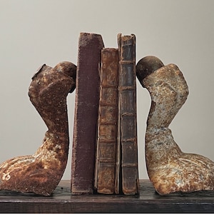 Antique Pair of Cast Iron Leg Bookends
