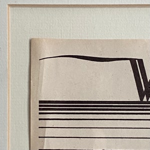 May include: A black and white abstract print with a curved line and a series of parallel lines.