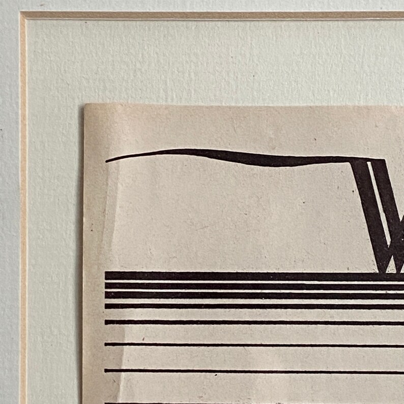 May include: A black and white abstract print with a curved line and a series of parallel lines.
