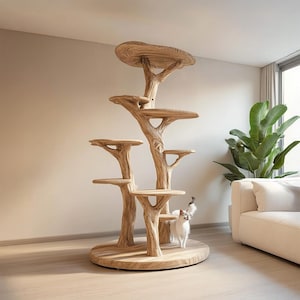 Peut inclure: Un arbre à chat en bois avec plusieurs plateformes et un design en forme d'arbre. La structure présente une finition en bois naturel et plusieurs plateformes circulaires de différentes tailles. Un chat blanc et gris se tient sur l'une des plateformes.