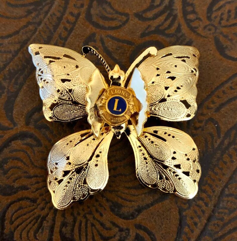 Vintage Lions International Butterfly Brooch 719