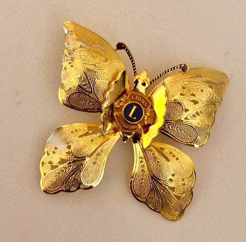 Vintage Lions International Butterfly Brooch 719