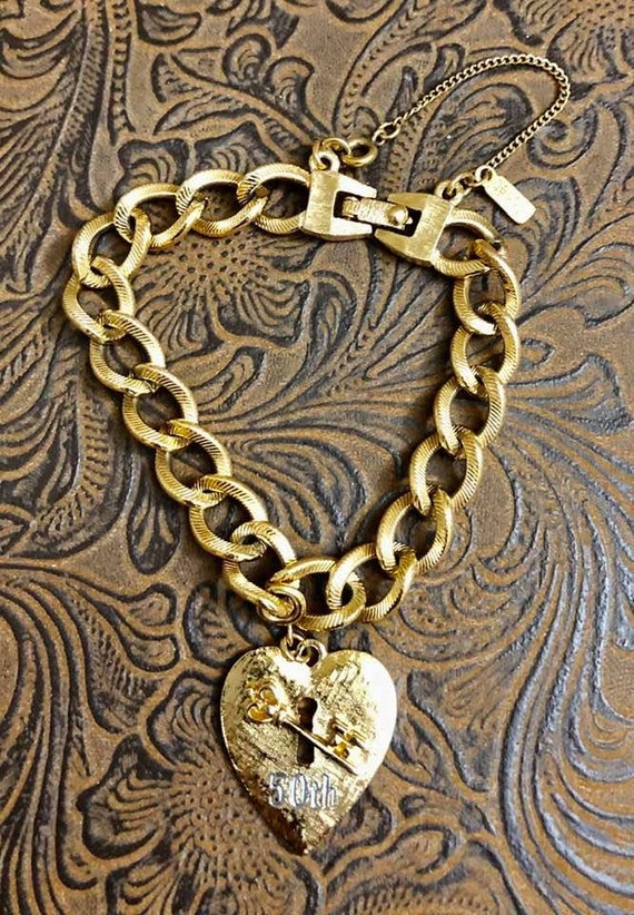 Bracelet Doré Avec Pendentif étoile - Marque Monet - Occasion Bon état