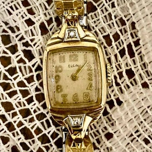 Elgin starlite watch hot sale