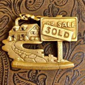 Vintage AJC Real Estate Brooch                     230