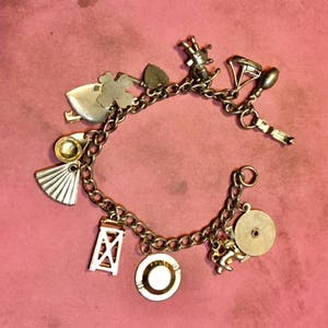 Vintage CORO Silver Tone Charm Bracelet Loaded with Charms  C                054
