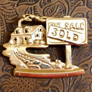 Vintage AJC Real Estate Brooch                     232