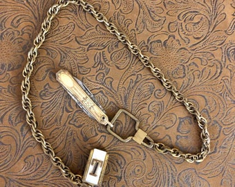 Cadena de reloj de bolsillo vintage y cuchillo 952