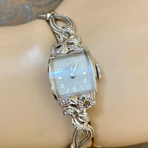 Reloj Elgin vintage para mujer en oro de 14 quilates con diamantes GW5