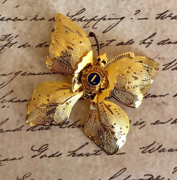 Vintage Lions International Butterfly Brooch 719