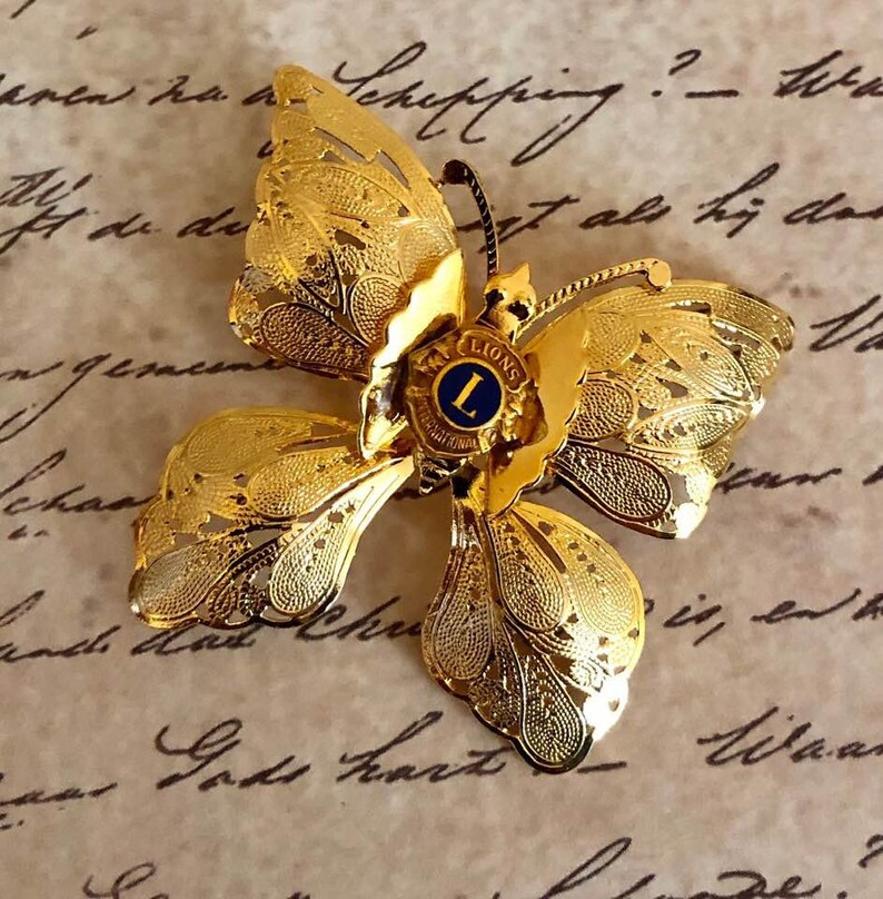 Vintage Lions International Butterfly Brooch 719