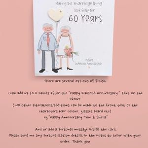 May include: A white greeting card featuring a cartoon illustration of an elderly couple. The text reads: Making this marriage thing look easy for 60 Years and Happy Diamond Anniversary. A small cream heart and pink fabric flowers are attached.